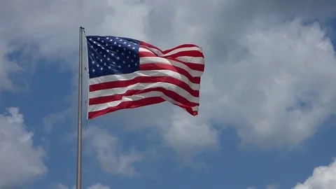 US flag waving in strong wind Stockbeeldmateriaal 91506472