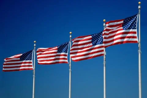 US flags flapping in wind Stock Photos
