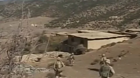 US forces raid villages in hunt for Taliban and Al Qaida elements (2) Video stock 235253188