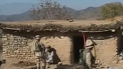 US forces raid villages in hunt for Taliban and Al Qaida elements (6) Video stock 235253305