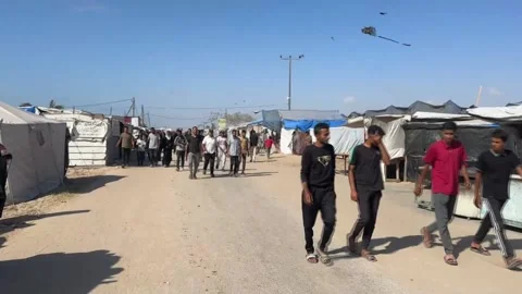 A US foundation has begun distributing food parcels in southern Gaza, RAFAH, PS  Video stock 310213240