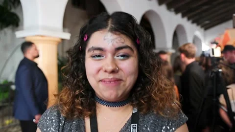 US: Funny Interview With Student With Adam Sandlers Autograph on Her For... Stock Footage 328878950