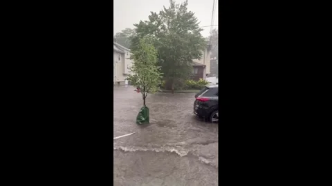 US: Heavy Rain and Hail Trigger Flash Flooding Across New Jersey 2 Video stock 340932558