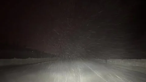 US: Heavy snow shuts down Interstate 80 in Truckee, California (2) Stock Footage 324965942