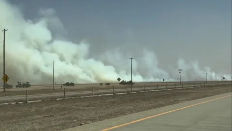 US: High Winds Spark Multiple Wildfires Across Texas Panhandle, Forcing E... Stock Footage 335265087