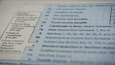 US Individual Income Tax Return Form 1040 Stock Footage