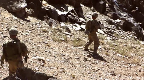 U.S. infantry soldiers from Forward Operating Base Airborne on patrol Stock Footage 32632348