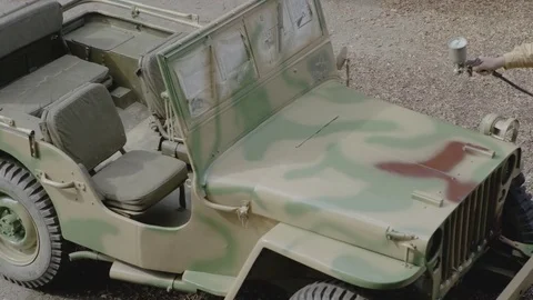 US Jeep getting german camouflage paint Stock Footage