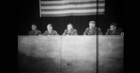 U.S. Judge Advocate questioning the Nazi commandant Stock Footage