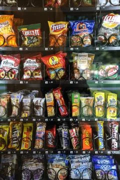 U.S. Junk food in a vending machine Stock Photos