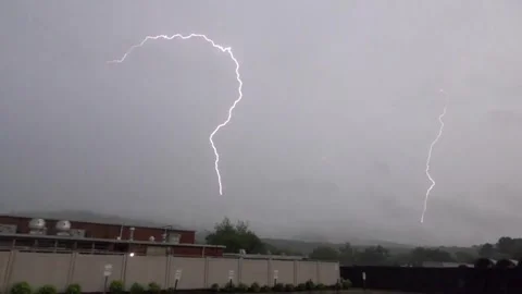 US: Lightning flashes repeatedly across stormy sky in Huntsville, Alabama... Stock Footage 333109387