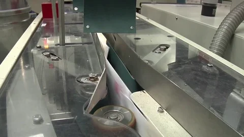 U.S. mail and packages are sorting at a USPS sorting facility. Stock Footage 74829157