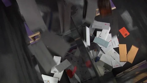 U.S. mail and packages are sorting at a USPS sorting facility. Stock Footage 123370051