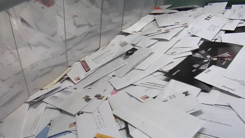 U.S. mail and packages are sorting at a USPS sorting facility. Stock Footage 123373458