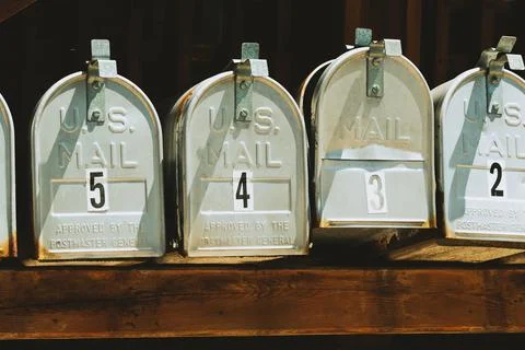 U.S. Mail boxes lined up 库存照片