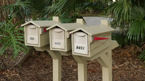 US Mailboxes, closeup of three numbered mailboxes. Stock Footage 160500810