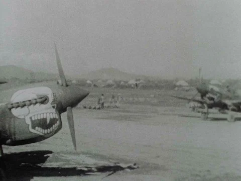 A U.S. makeshift airstrip, functioning in the Burmese countryside, is Stock Footage 75298779