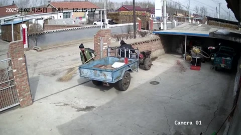 US: Man carefully parks a two-wheel tractor with utility trailer in Beiji... Stock Footage 326375625