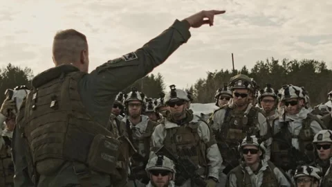 U.S. Marine addressing troops during military exercise Nordic Response Stock Footage 262546292