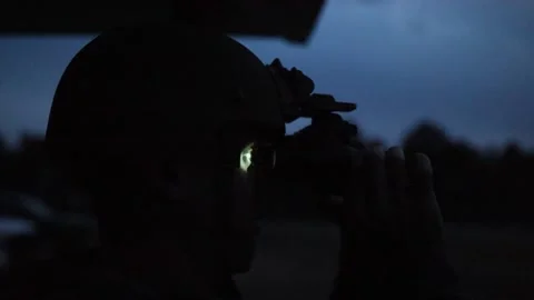 U.S. Marine observing through night vision binoculars Stock Footage 295620505
