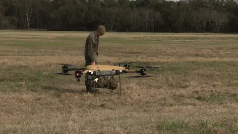 U.S. Marine programming TRV-150 small unmanned aircraft prior to launch Stock Footage 231765201