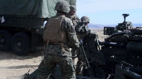 U.S. Marine setting up M777 Howitzer for artillery training Stock Footage 83579393