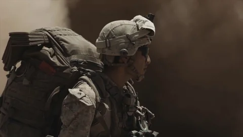U.S. Marine walking with back pack Stock Footage 93501012