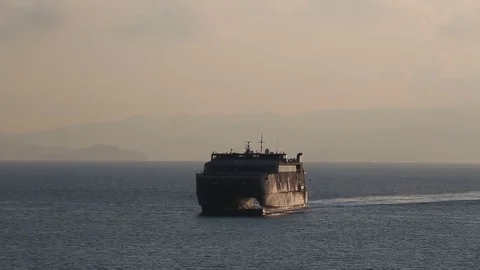 U.S. Marines aboard USNS Guam (HST1) approaching harbor at Iwakuni Stock Footage 83448265