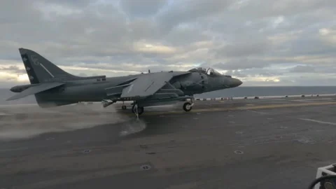 U.S. Marines AV-8B Harrier II aircraft launches from USS Kearsarge (LHD 3) Stock Footage 227138201