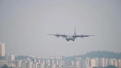U.S. Marines C-130 Hercules approaching Suwon Air Base, South Korea Stock Footage 280971048