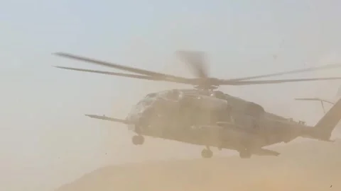 U.S. Marines CH-53 Super Stallion creates sandstorm during take off Stock Footage 269133170