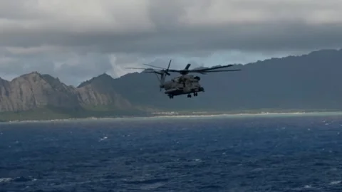 U.S. Marines CH-53 Super Stallion flying over Pacific Ocean Stock Footage 280552811