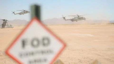 U.S. Marines CH-53 Super Stallion helicopters landing in desert area Stock Footage 334835304