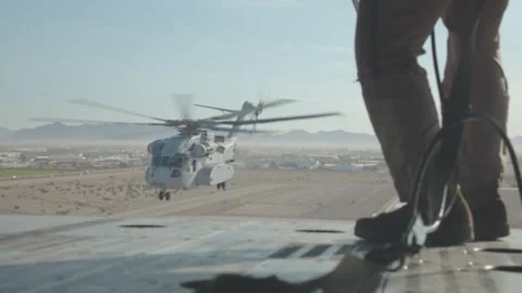 U.S. Marines CH-53K King Stallion flying behind CH-53K helicopter Stock Footage 254475009