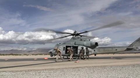 U.S. Marines complete refueling of UH-1Y Venom helicopter Video stock 264287295