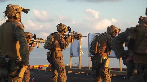U.S. Marines conducting low light shoot training aboard USS Wasp (LHD 1) Stock Footage 284083585