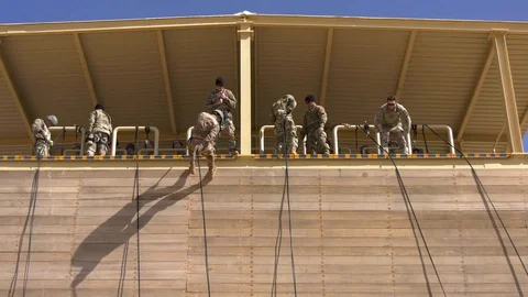 U.S. marines descending rappel tower at Camp Beuhring, Kuwait Video stock 103201912