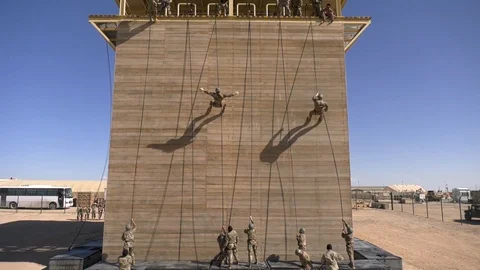 U.S. marines descending rappel tower at Camp Beuhring, Kuwait Video stock 103201916