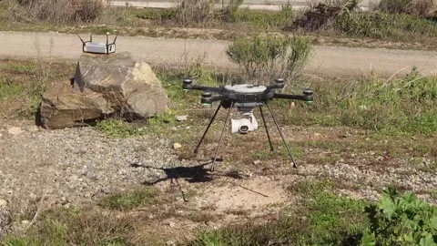 U.S. Marines drone with backpackable electronic attack module (BEAM) landing Video stock 267958361