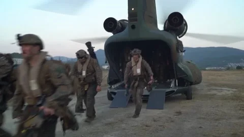 U.S. Marines exiting rear CH-47JA Chinook helicopter during exercise Keen Sword Video stock 221554701