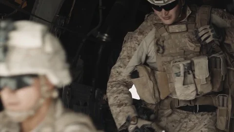 U.S. Marines exiting rear of MV-22 Osprey  Stock Footage 93501002