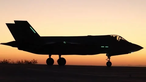 U.S. Marines F-35B Lightning II aircraft at sunset Stock Footage 258434802