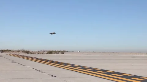 U.S. Marines F-35B Lightning II aircraft approaching runway for landing at Yuma Video stock 258434844
