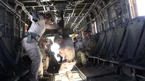U.S. Marines fast-roping out of CH-53 Super Stallion helicopter Stock Footage 280034167