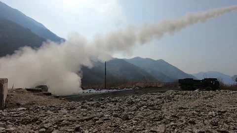 U.S. Marines fire rockets from High Mobility Artillery Rocket System HIMARS Stock Footage 274133932