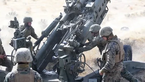 U.S. Marines loading M777 Howitzer Stock Footage 83579255