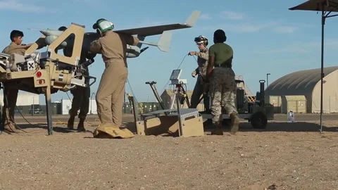 U.S. Marines loading RQ-21A Blackjack onto launchpad Stock Footage 213923184