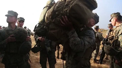 US Marines loading vehicles for Exercise Dawn Blitz training at Camp Pendleton Stock Footage 81784213