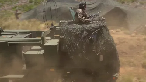 U.S. Marines M142 High Mobility Artillery Rocket System travelling cross country Stock-Footage 201928281