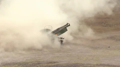 U.S. Marines M142 High Mobility Artillery Rocket System launching missile Stock Footage 201928324